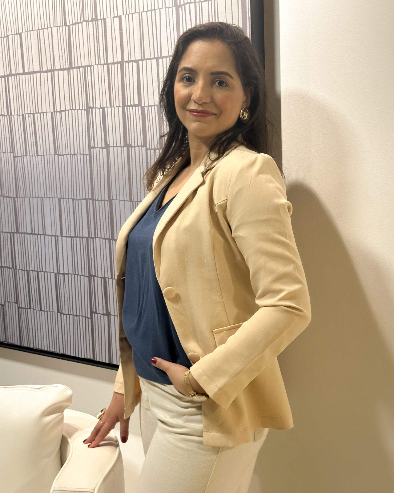 Carla Suzana Marinho standing in the office