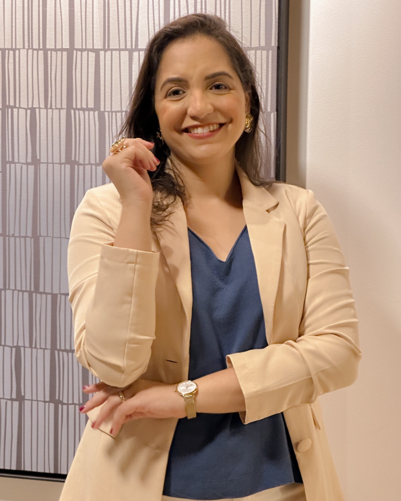 Carla Suzana Marinho smiling in the office
